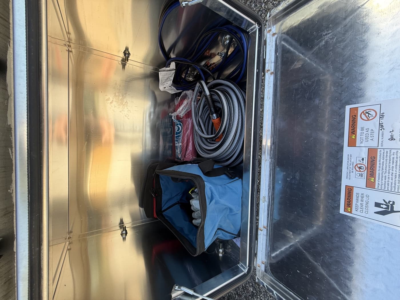Clean organized service tools stored in the Open Range truck toolbox.